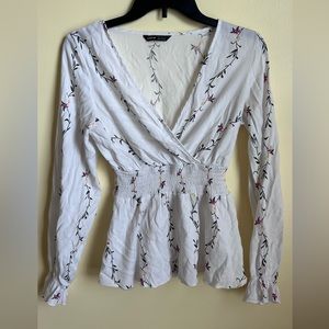 white floral v-neck top